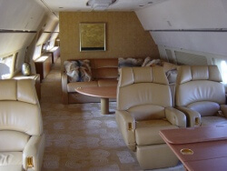 A converted airliner with a spacious and comfortable lounge